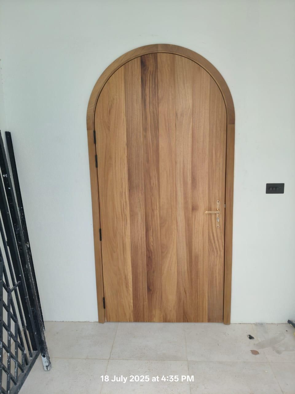 Arched Walnut Door